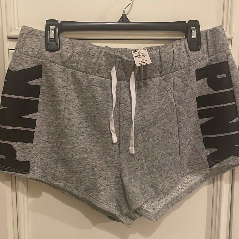 Pink shorts and windbreaker